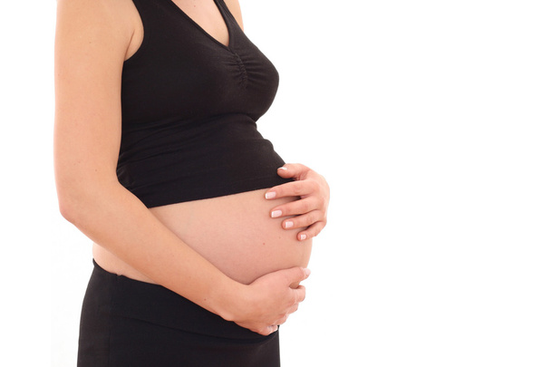nuori raskaana oleva nainen eristetty valkoinen - Valokuva, kuva