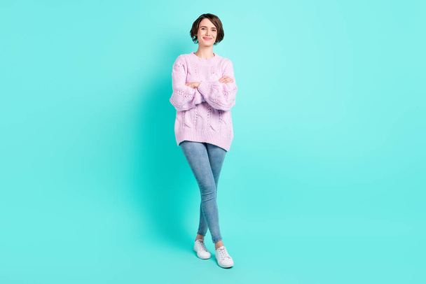 Full length photo of pretty charming young lady dressed purple pullover standing arms crossed isolated teal color background - Foto, Bild