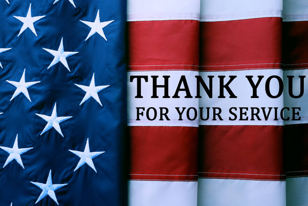 American flag as background and text THANK YOU FOR YOUR SERVICE, top view. Memorial day - Foto, Bild