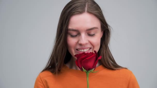Attractive girl with red rose Charming Appearance Natural Beauty. - Imágenes, Vídeo