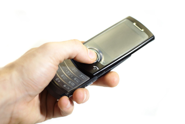 Рука з мобільним телефоном ізольовано на білому тлі
 - Фото, зображення
