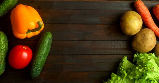 Food background with different vegetarian vegetables. - Foto, Imagen