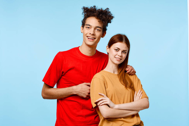 young couple cropped view studio blue background communication - Photo, Image