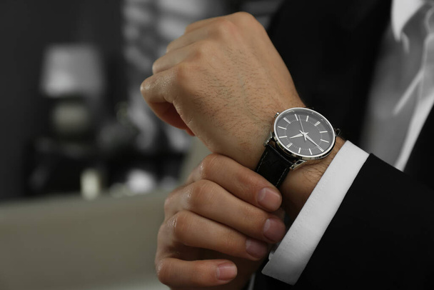 Businessman with luxury wrist watch indoors, closeup - Foto, Imagem