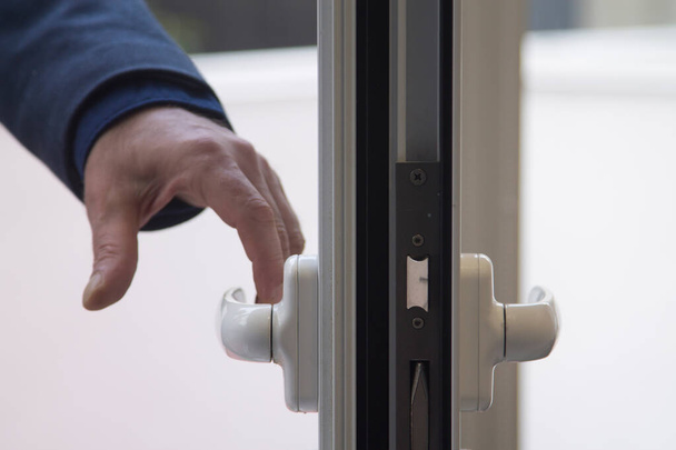 man opening the apartment door, real estate concept - Фото, изображение