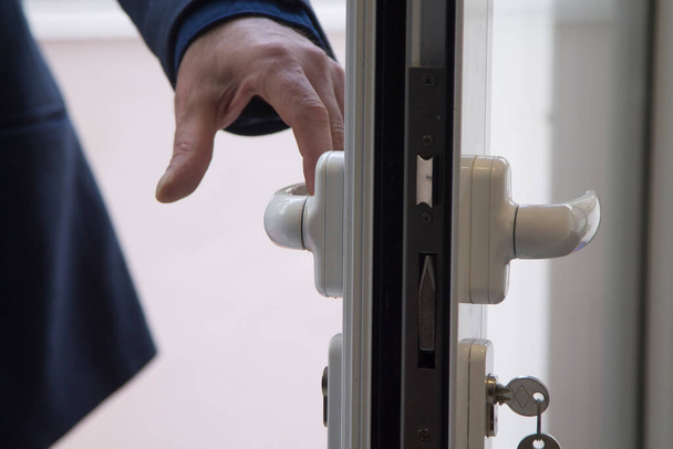 man opening the apartment door, real estate concept - Photo, Image