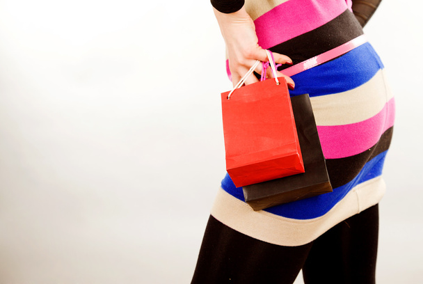 Young woman with red bag present - Foto, imagen