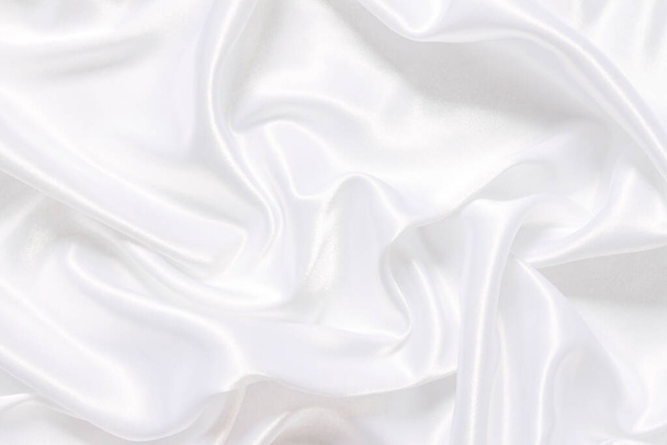 Fond en tissu blanc abstrait avec des vagues douces. - Photo, image