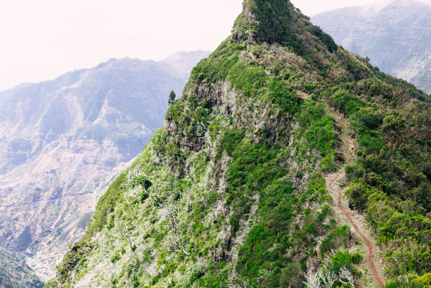 The top hiking trails in Madeira. Beautiful landscape of green mountains with trails. Copy space. Trip  to island.  - Foto, imagen