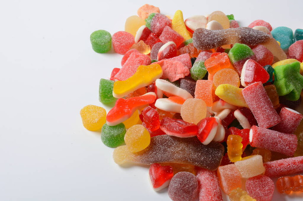 A lot of colorful assorted gummy candies.  Juicy colorful jelly sweets - Fotó, kép