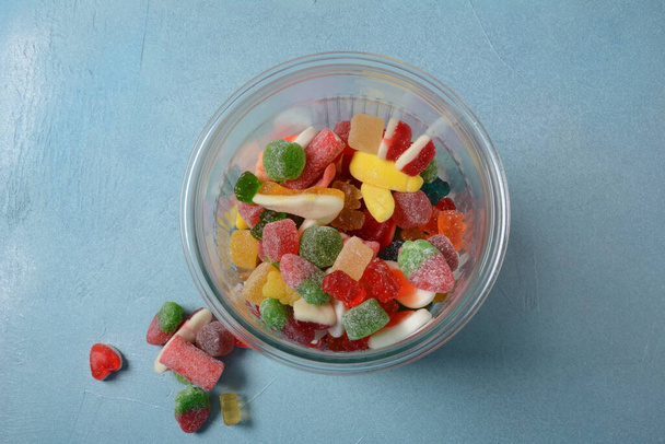 A lot of colorful assorted gummy candies.  Juicy colorful jelly sweets - Fotó, kép