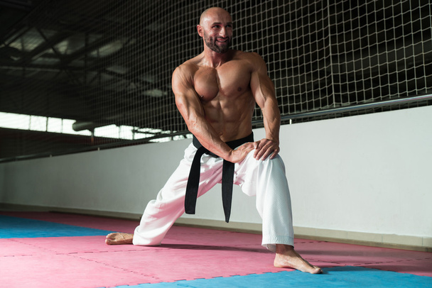 Flexible Man Stretching Before Training - Fotoğraf, Görsel