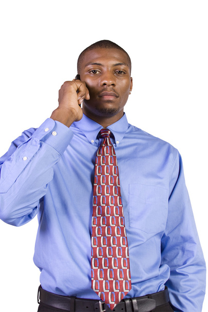 Isolated Black businessman with his hand in pocket talking on the phone - Photo, Image