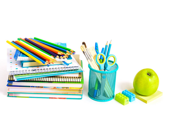 Back to school concept. Notebook stack and school pencils. Schoolchild and student studies accessories. - Foto, Imagem