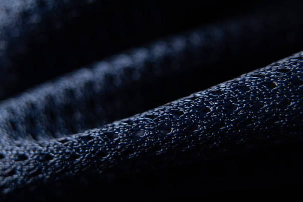 dark blue fabric wrinkled as background close-up - 写真・画像