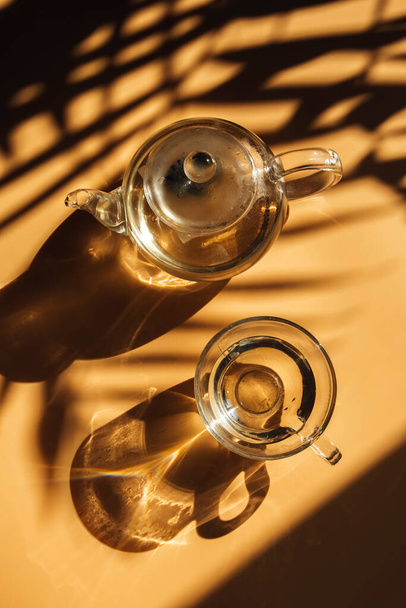 glass teapot and cup  - Fotó, kép