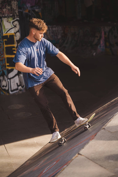Southbank, London | UK -  2021.04.17: Skaters performing tricks at the Southbank Skate Space - 写真・画像