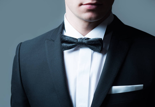 Elegant male fashion. Black suit. Gentleman in black suit. Classic formal stylish clothes. - Foto, immagini