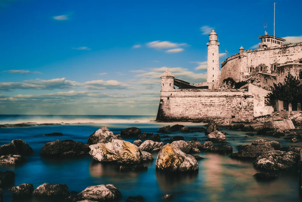 Long exposure image of El Morro castle and lighthouse in Havana - 写真・画像