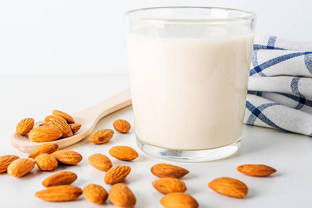 Cooked nuts vegetable drink. Almonds milk in glass. Homemade food concept. Plant based organic veggie milk, lactose free. close up - Valokuva, kuva