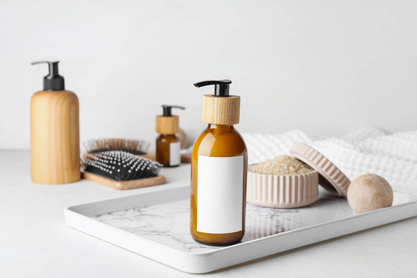 Bottle with natural shampoo on light background - Foto, Imagem