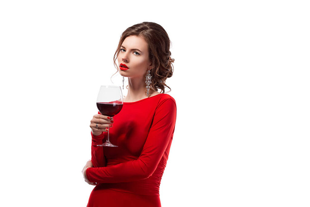 Beautiful woman holding glass of wine onwhite background - Foto, imagen