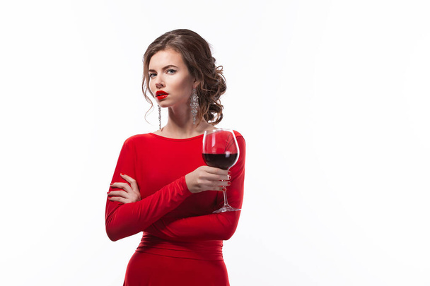Beautiful woman holding glass of wine onwhite background - Fotoğraf, Görsel