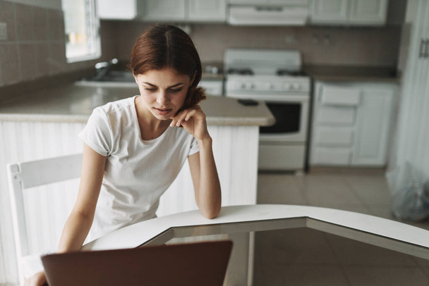 woman caught indoors freelancer working at home laptop interior design - Photo, Image