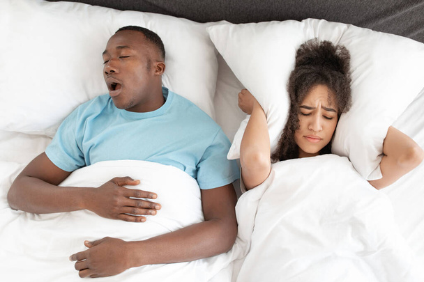 Family problems, apnea and insomnia due spouse - Photo, Image