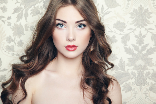 Portrait of young beautiful girl with wavy hair - Zdjęcie, obraz