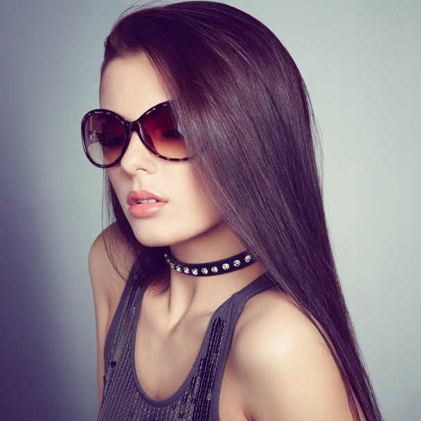 Young beautiful girl in sunglasses. - Valokuva, kuva