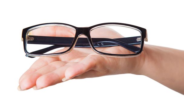 a női kéz szemüveg - Fotó, kép