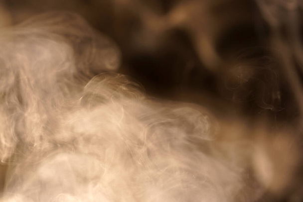 A gray-brown texture with a smoke cloud - Foto, Imagen