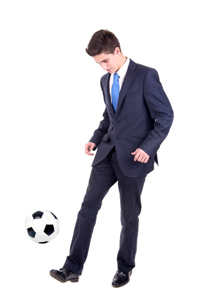 Businessman playing soccer - 写真・画像
