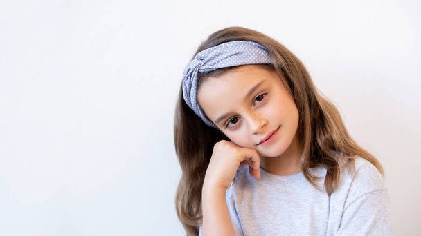 thoughtful kid portrait daydreaming cute girl face - 写真・画像