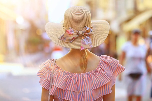 tourism summer old town female, europe mediterranean, young woman traveler, back straw hat view - Photo, Image