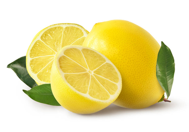 Fresh ripe raw lemons with green leaves isolated on white background. Whole and cut yellow lemon, high resolution image - Foto, imagen