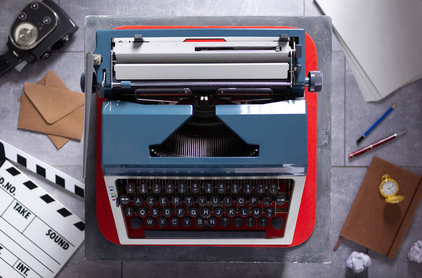Vintage typewriter at table and relax creative concept design. Movie and screenwriter or writer concept - Photo, Image