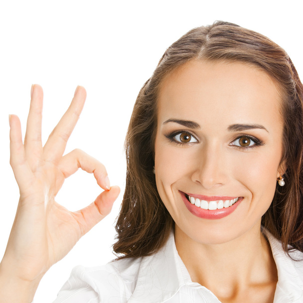 Business woman with okay gesture, on white  - Foto, immagini