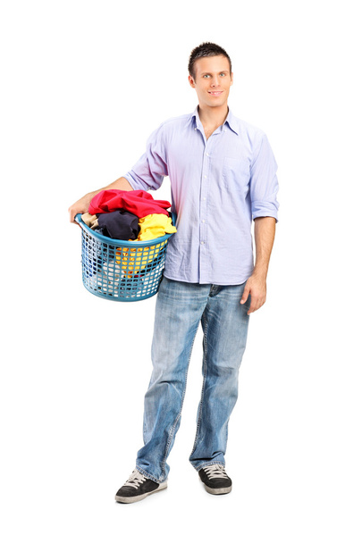 Man holding laundry basket - Foto, Bild