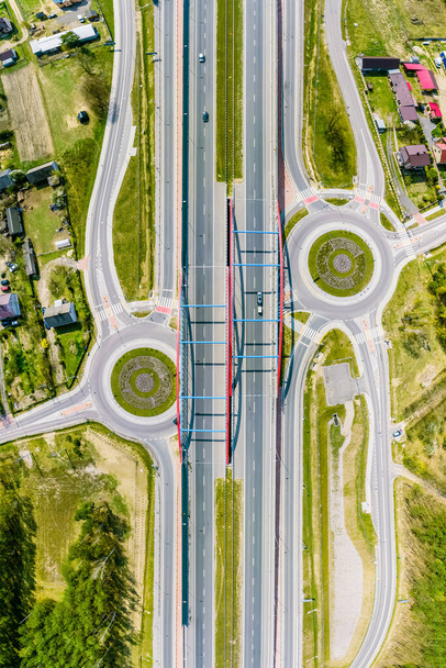 Road junction with two roundabouts aerial view - Fotografie, Obrázek