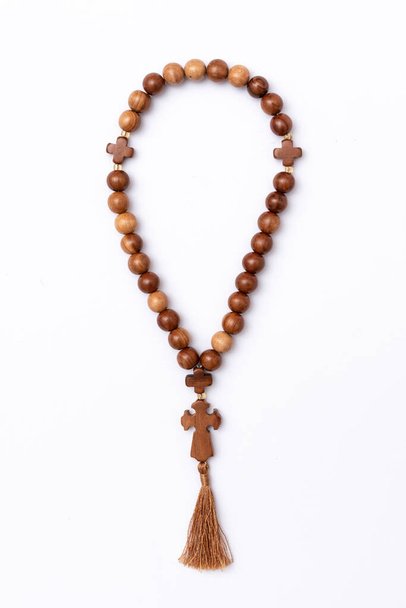 Christian prayer rosary beads isolated on white background. - Photo, image