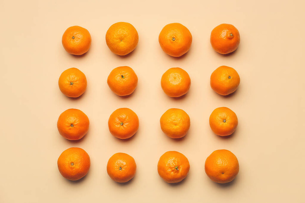 Sweet tangerines on color background - Foto, afbeelding