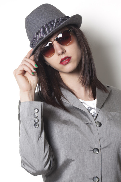 Gangster woman wearing a hat and looking - Φωτογραφία, εικόνα
