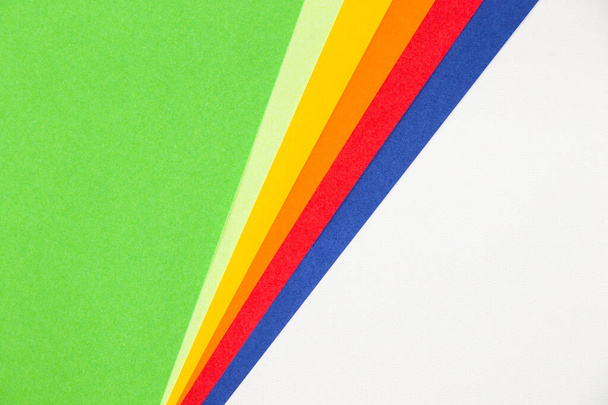 A closeup shot of colorful paper for background and wallpaper - Foto, afbeelding