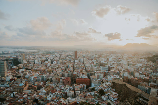 An aerial scenery of the Alicante city in Spain at sunrise - Photo, Image