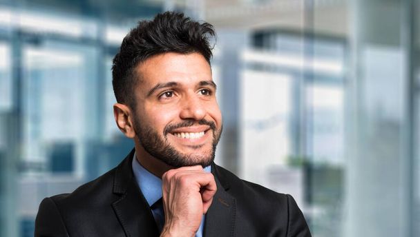 young handsome businessman smiling - Photo, Image
