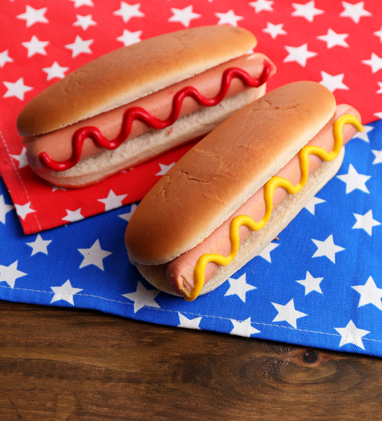 Tasty hot dogs on napkin with stars - Foto, Imagem