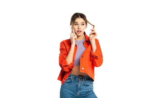 young woman in jeans, crop top and shirt talking on smartphone isolated on white - Φωτογραφία, εικόνα