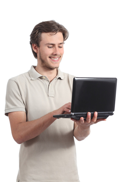 Young student boy browsing his netbook computer - Фото, изображение
